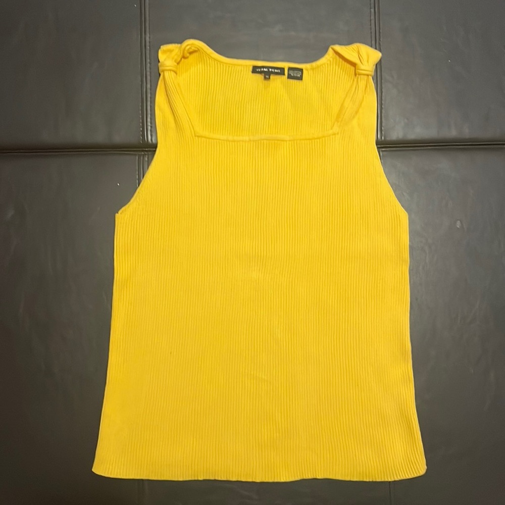 Woman’s sleeveless yellow tee shirt